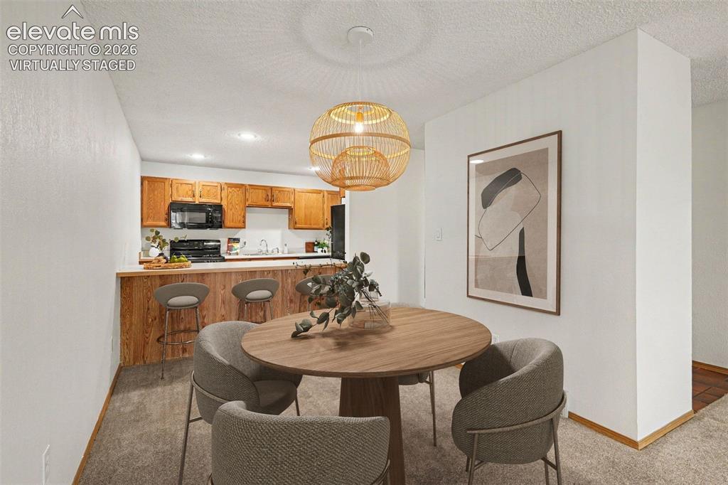 Image 7 of 30: Virtually staged dining area