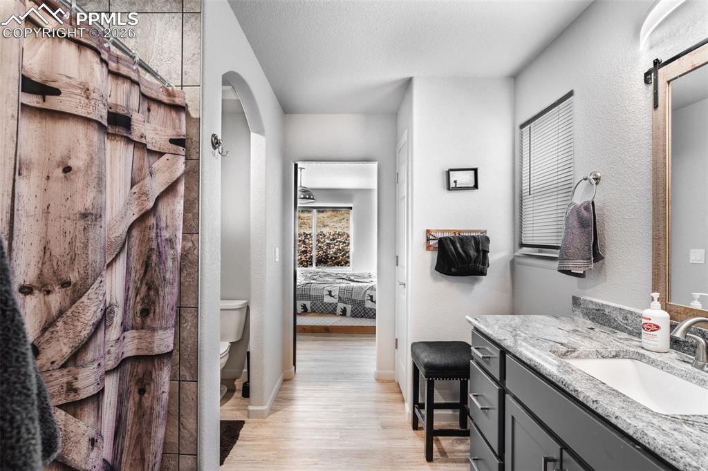 Image 18 of 50: Ensuite bathroom w/ shower