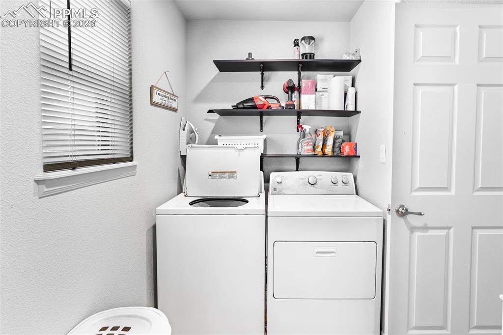 Image 21 of 50: Laundry with utility sink