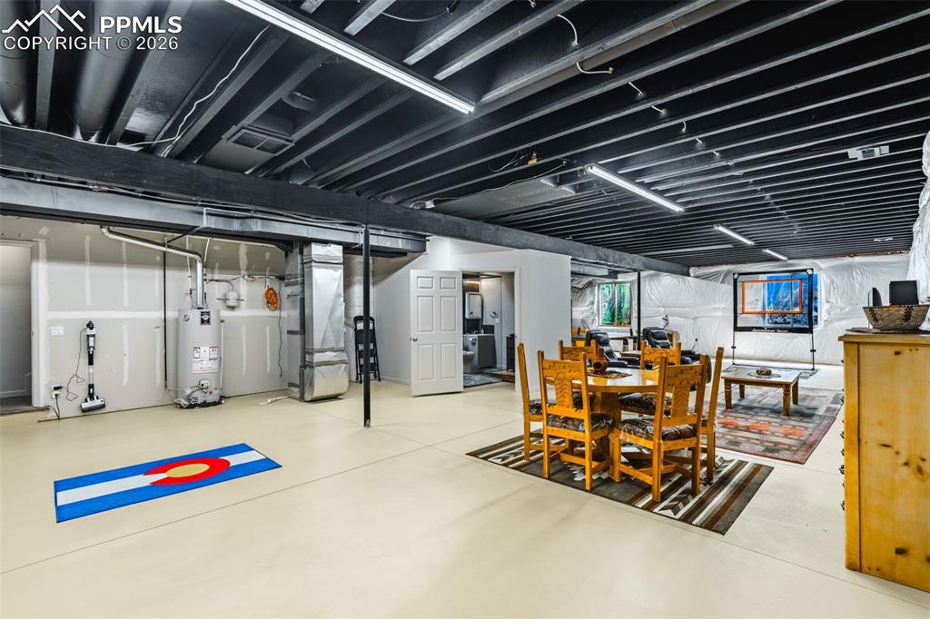 Image 25 of 50: Partially finished basement