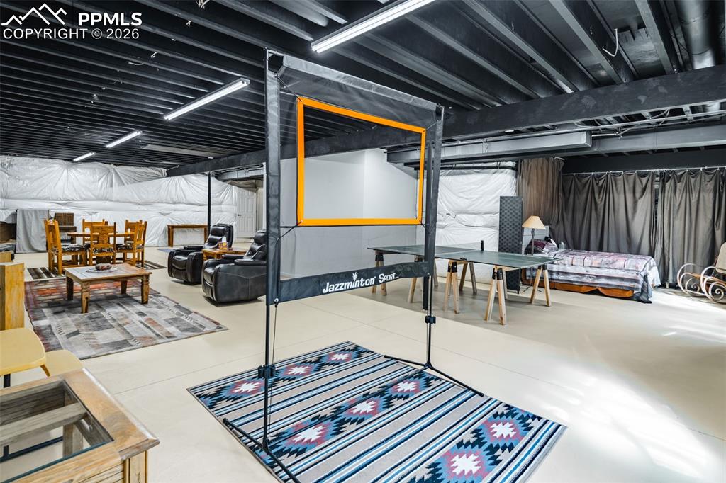 Image 26 of 50: Partially finished basement