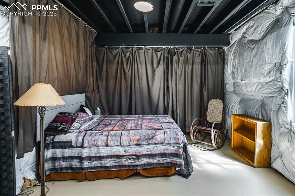 Image 28 of 50: Optional 4th bedroom in partially finished basement