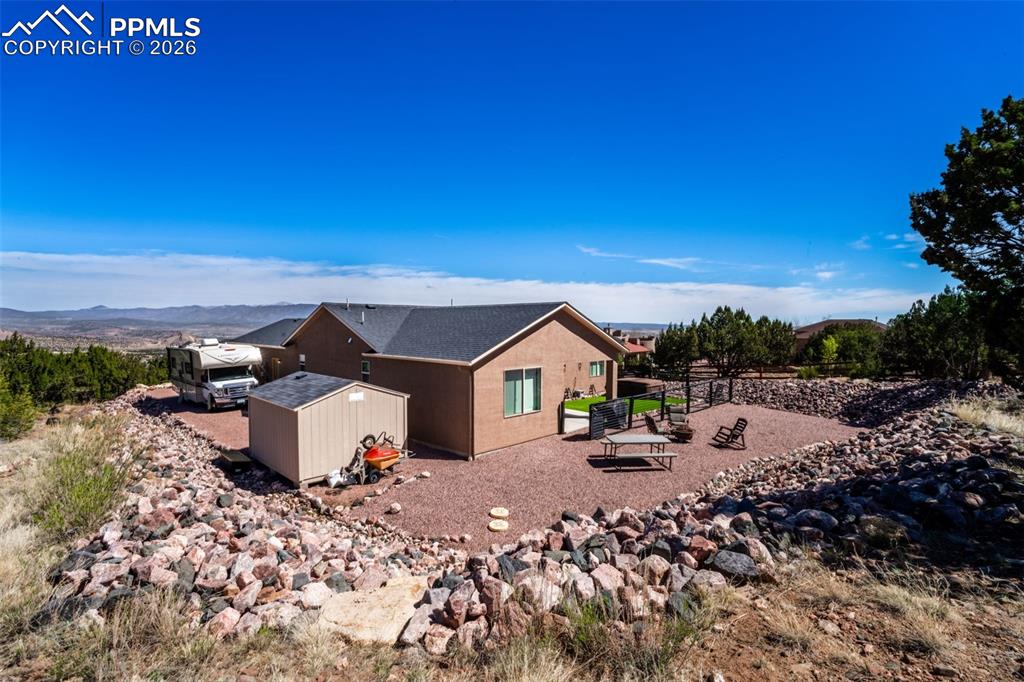 Image 35 of 50: View from included wooden swing