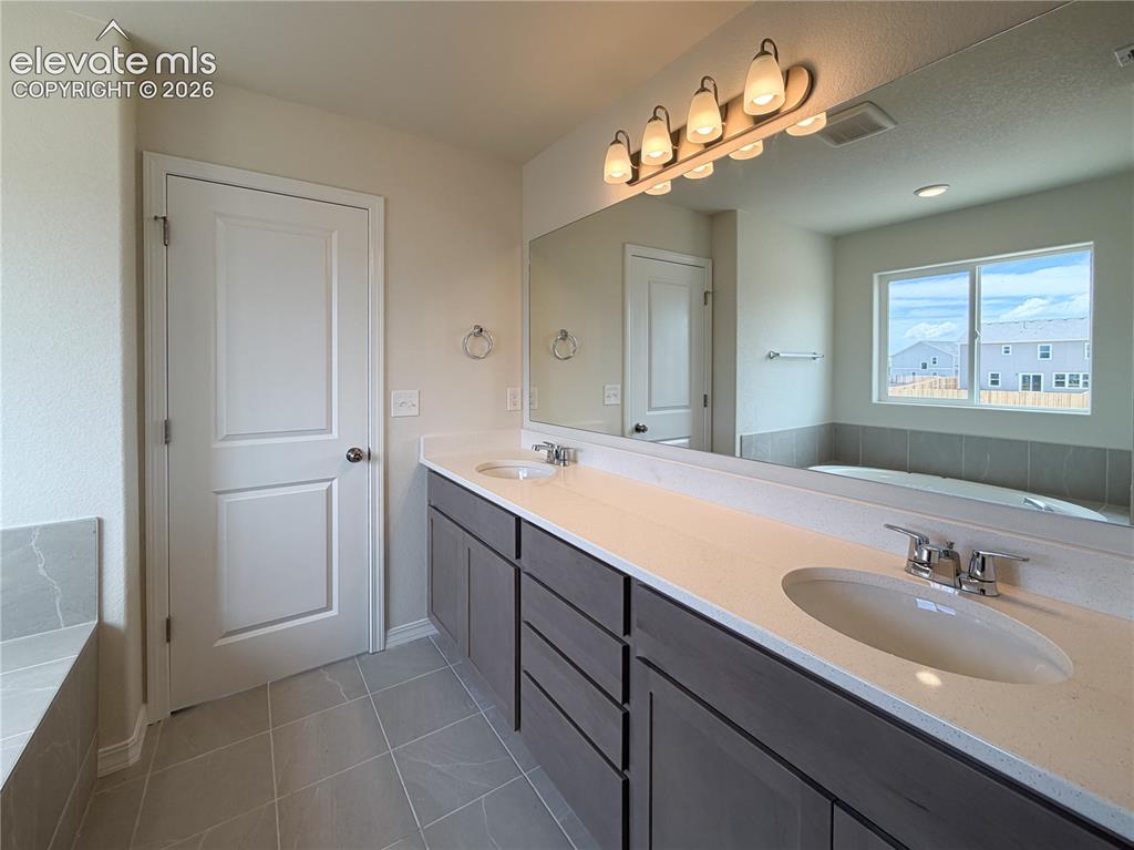 Image 24 of 42: Master Bathroom