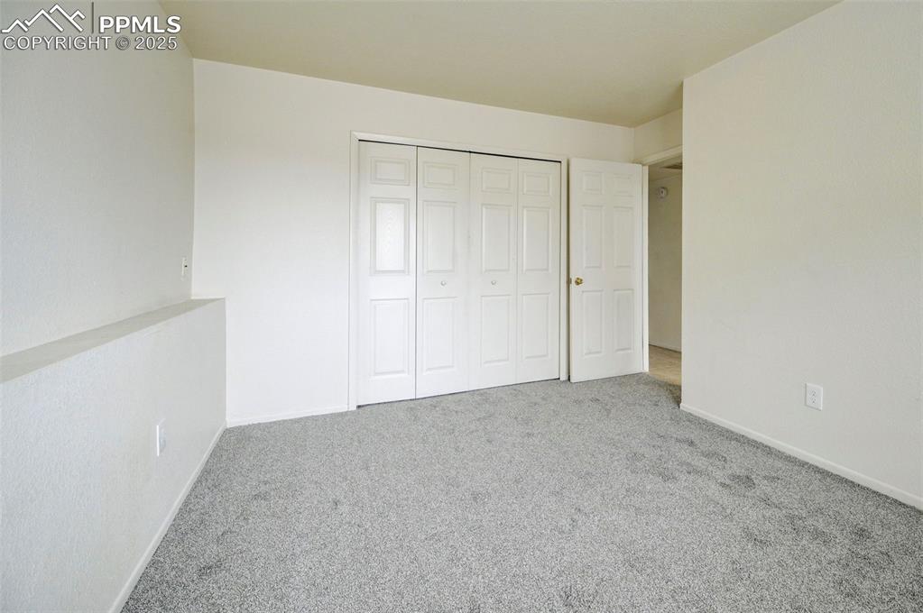 Image 10 of 14: Bedroom