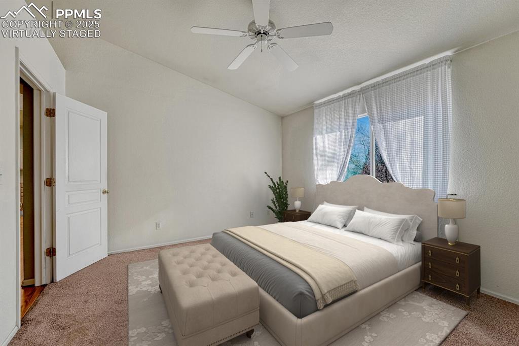 Image 14 of 50: Primary bedroom virtually staged