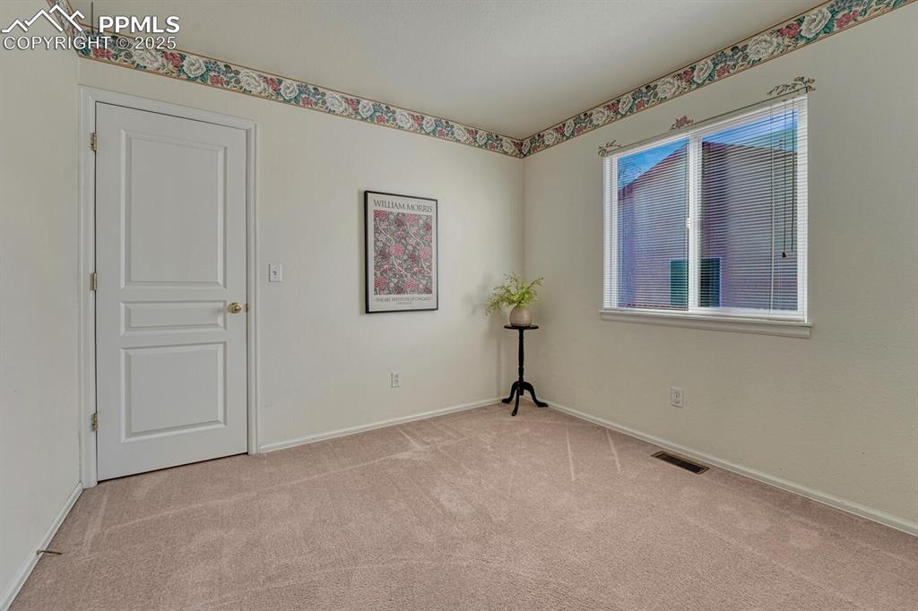 Image 18 of 50: Second bedroom