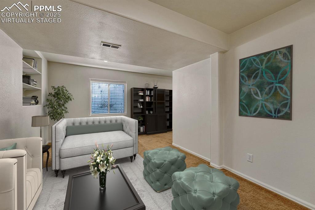 Image 24 of 50: Family room virtually staged