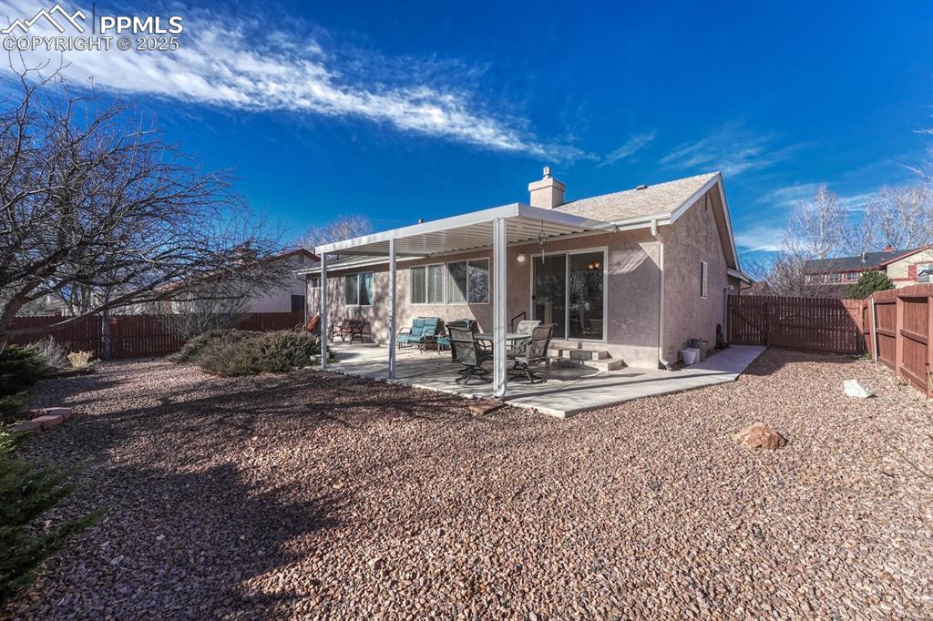 Image 29 of 50: Covered patio