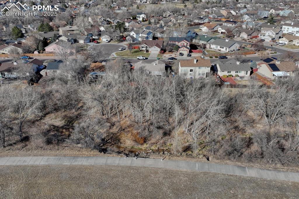 Image 35 of 50: Backs to open space