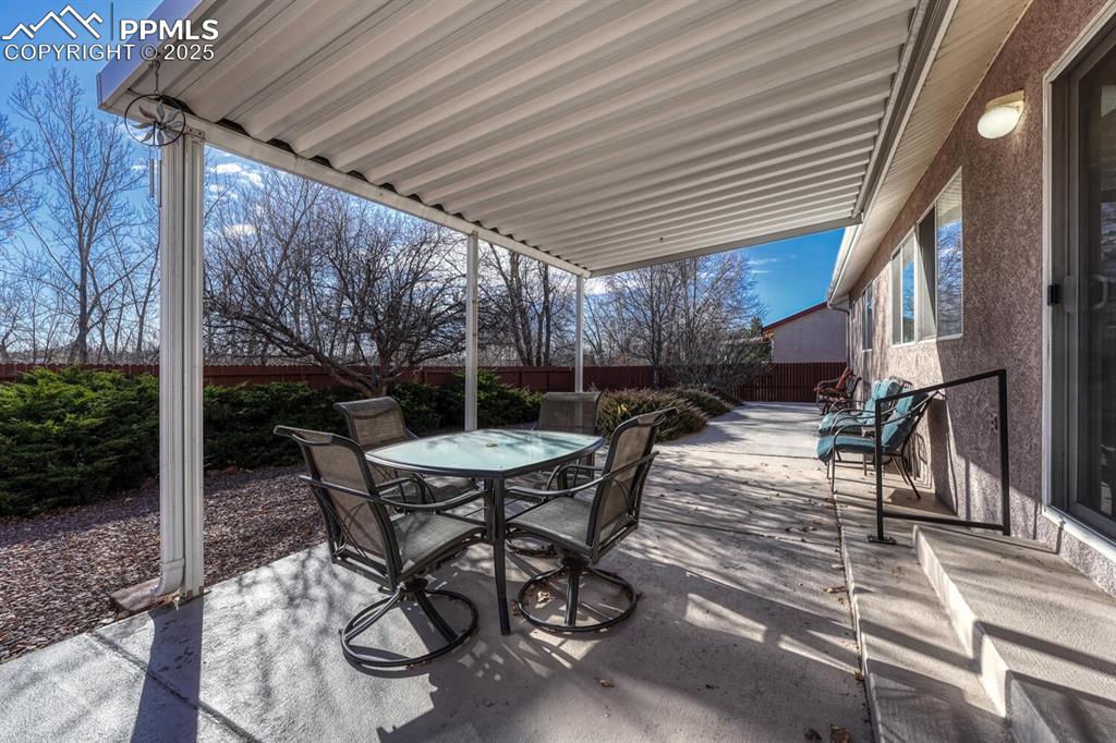 Image 4 of 50:  Take in the relaxing setting from your private covered back patio!