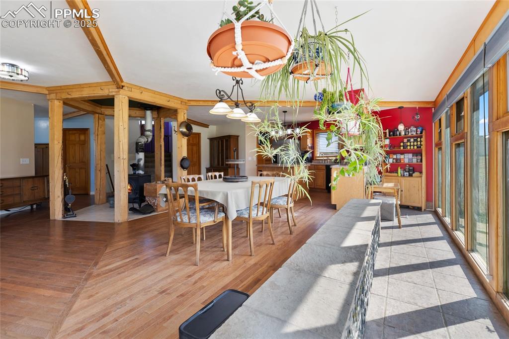 Image 13 of 46: Another view of the Wrap-Around Sunroom showing the Tea or Coffee Bar nook