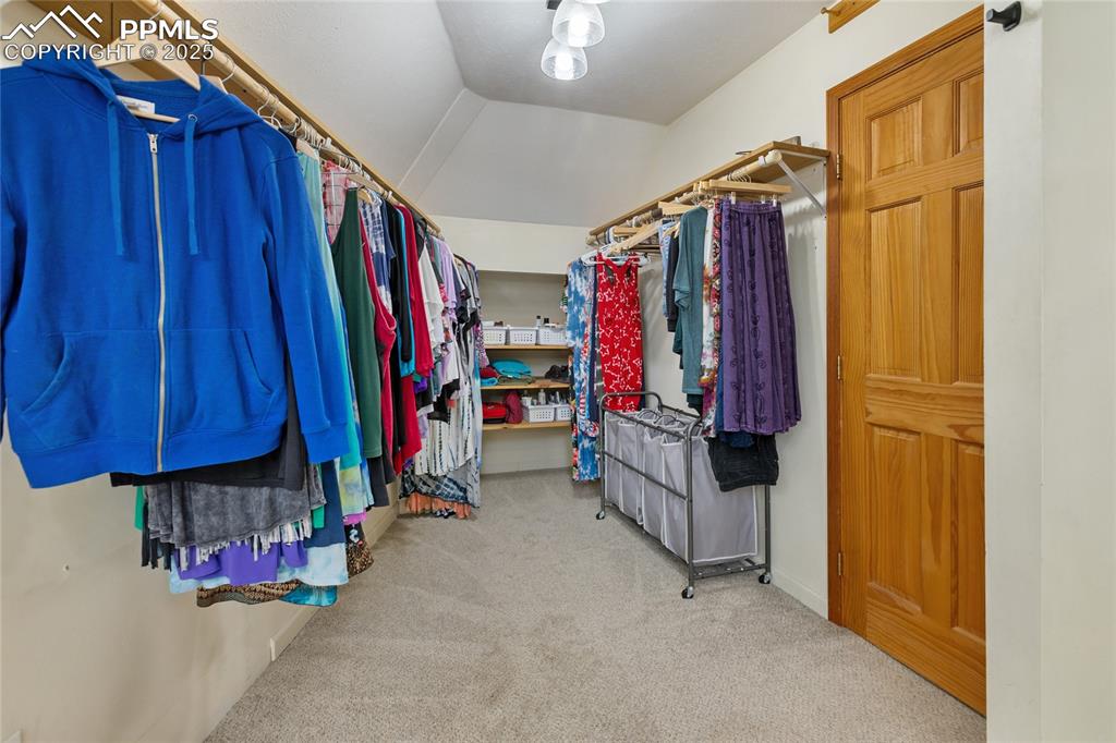 Image 29 of 46: Enormous Walk In Closet