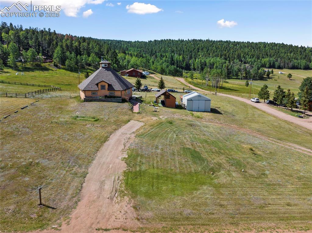 Image 3 of 46: 1.38 Acres with a Circular Drive and easy access on a County maintained roa
