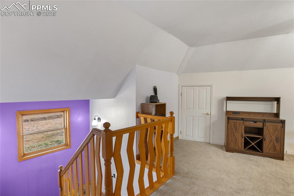 Image 30 of 46: Two separate entrances to walk in Attic Storage. No climbing a ladder for t