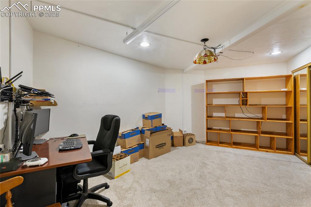 Image 38 of 46: Bedroom 4 which is non-conforming but has 2 exit doors