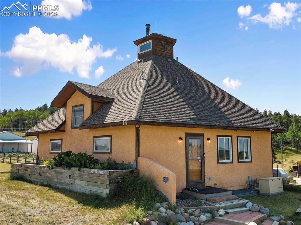 Image 4 of 46: 50 Yr Architectural Shingles and Stucco for easy maintenance