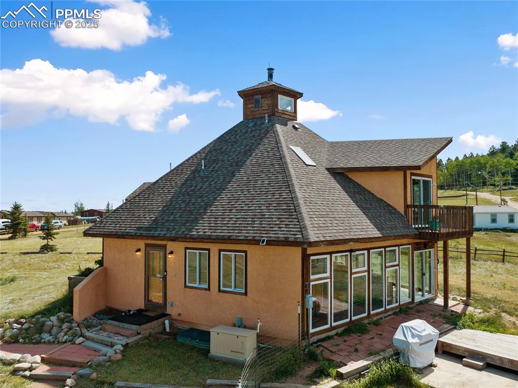 Image 45 of 46: Quite a few windows and both sliding glass doors have been replaced in the