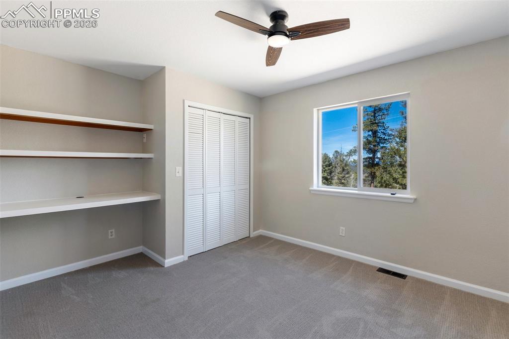 Image 24 of 38: Bedroom