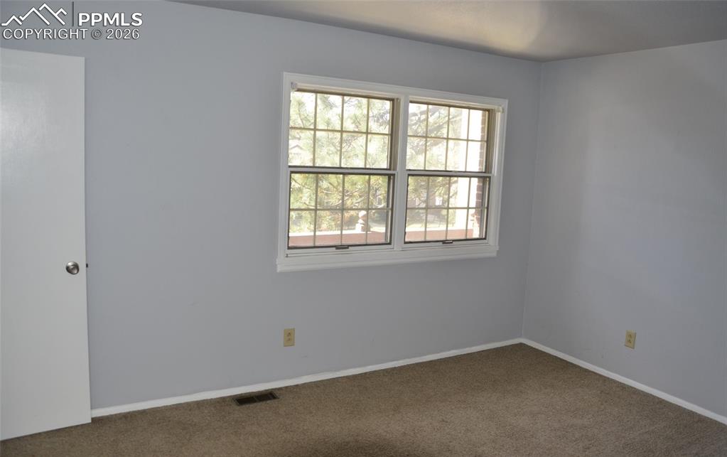 Image 9 of 14: Primary Bedroom