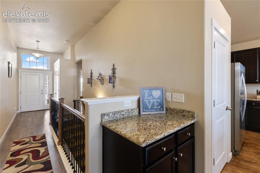 Image 12 of 32: Spacious entry offering convenient access to the main living areas