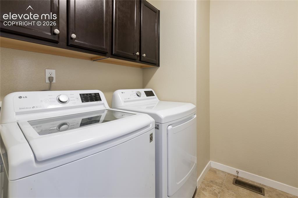 Image 25 of 32: Main level laundry room