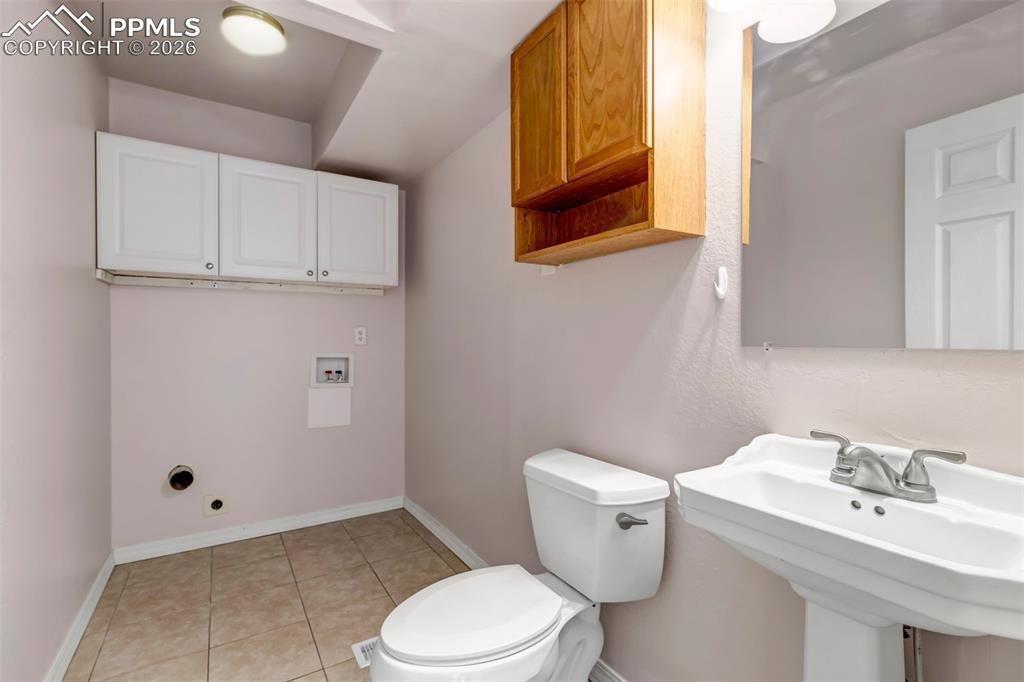 Image 14 of 50: & Main level Bathroom.