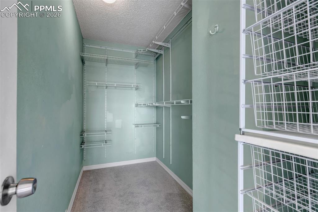 Image 21 of 50: Walk-in Closet.
Upper Level.