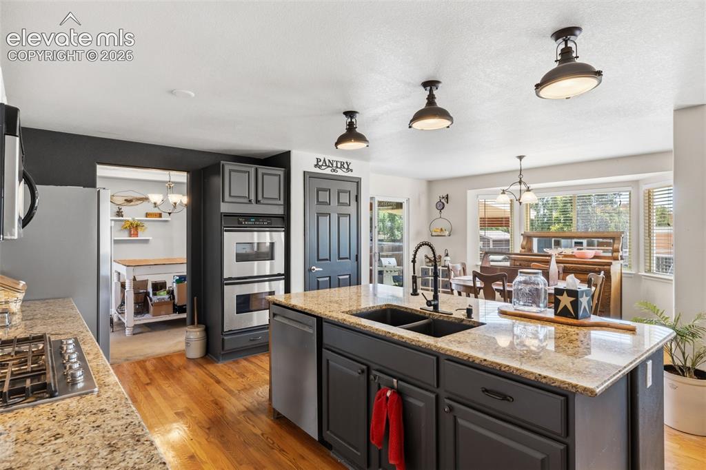 Image 14 of 47: Generous Prep Space & Walk-In Pantry