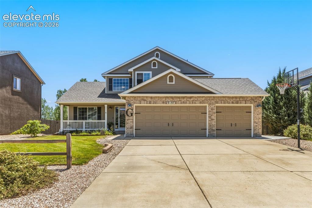 Image 2 of 47: Spacious Driveway & 3-Car Attached Garage