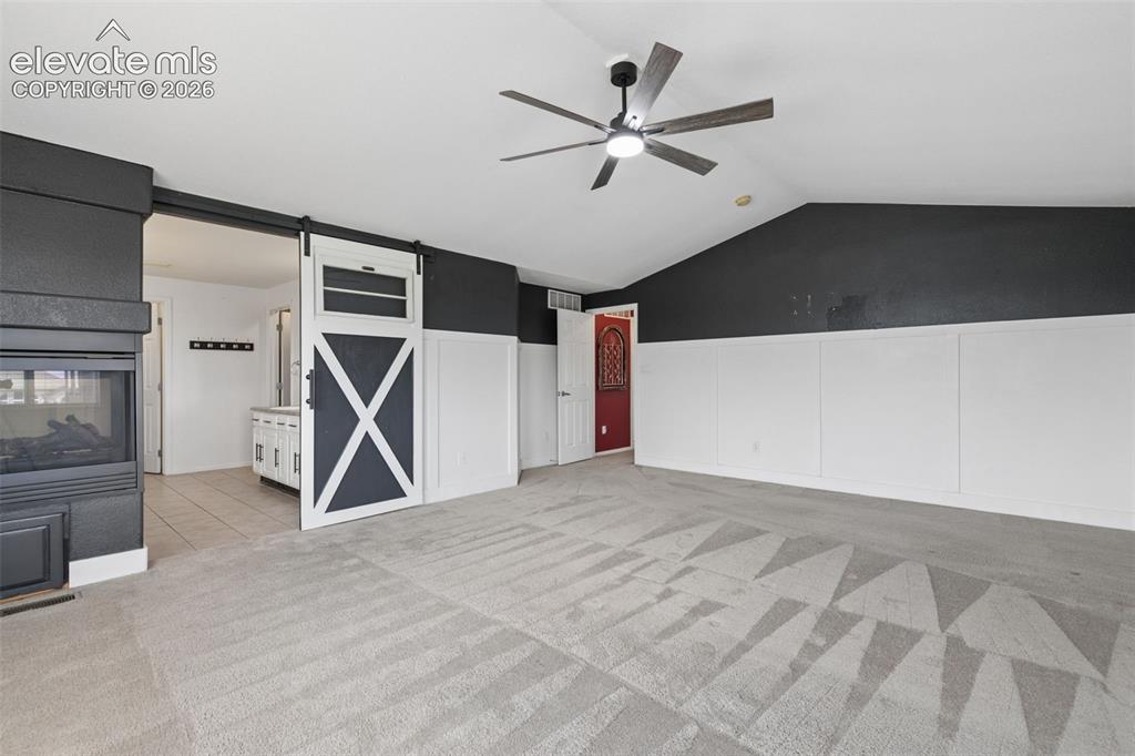 Image 28 of 47: Generous Layout with Fireplace & Flexible Sitting Area