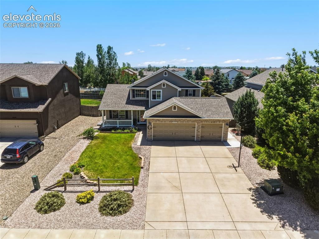 Image 3 of 47: Attractive Landscaping & Generous Off-Street Parking