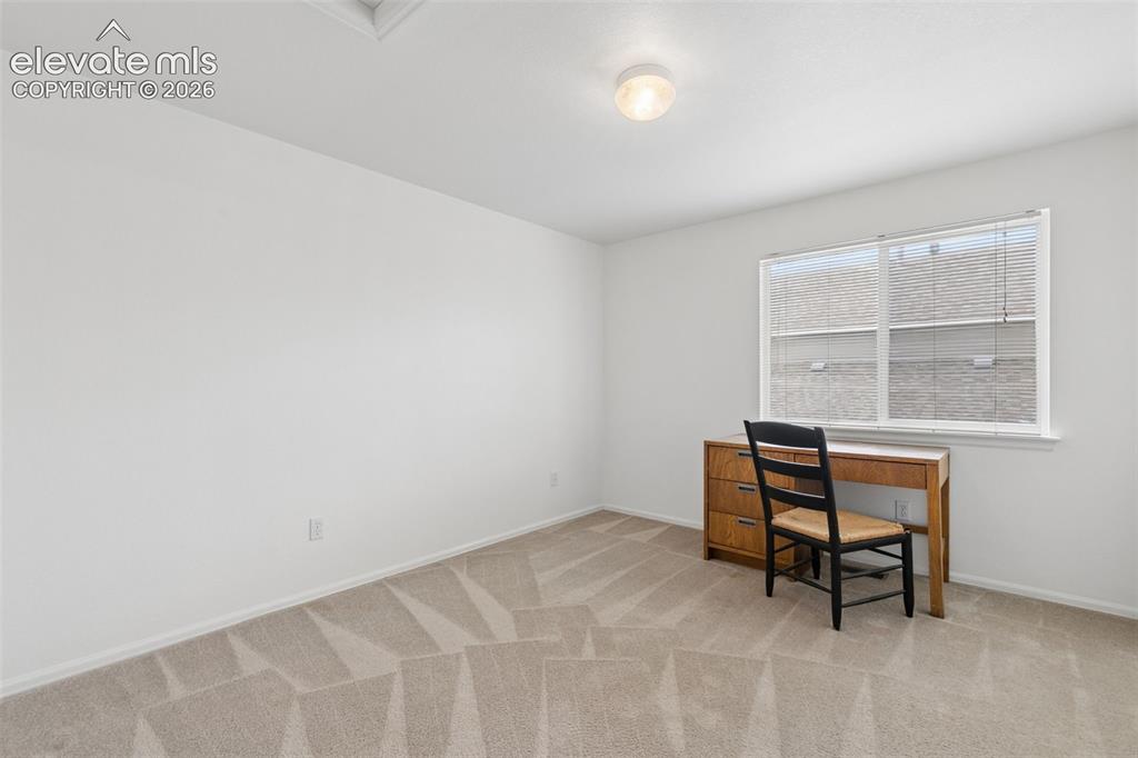 Image 31 of 47: Third Upstairs Bedroom with Great Natural Light