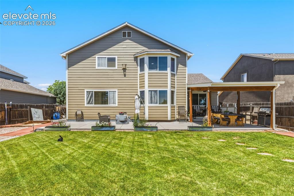 Image 40 of 47: Spacious Backyard with Room to Relax, Play & Entertain