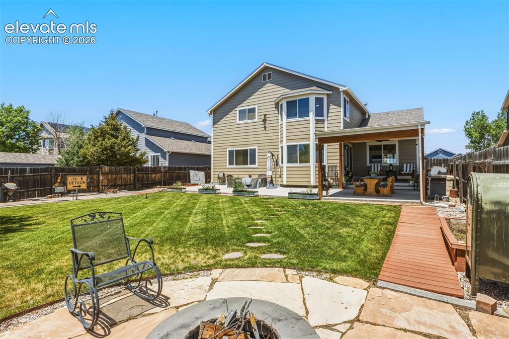 Image 41 of 47: Mature Landscaping, Lawn & Multiple Outdoor Entertaining Areas
