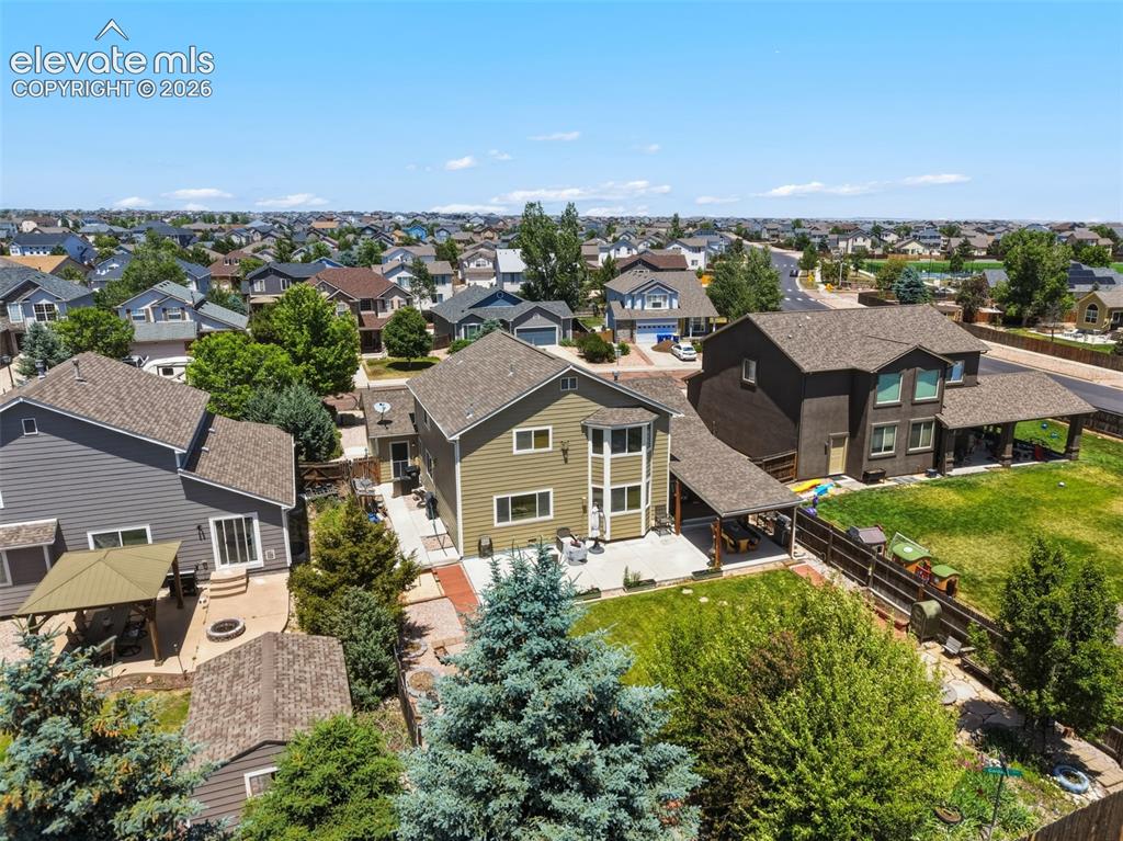 Image 44 of 47: Generous Fenced Lot with Patio, Lawn & Mature Landscaping