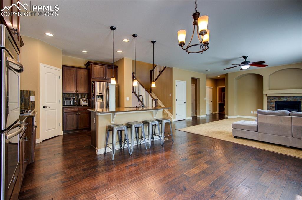 Image 15 of 50: Kitchen featuring open concept to great  room