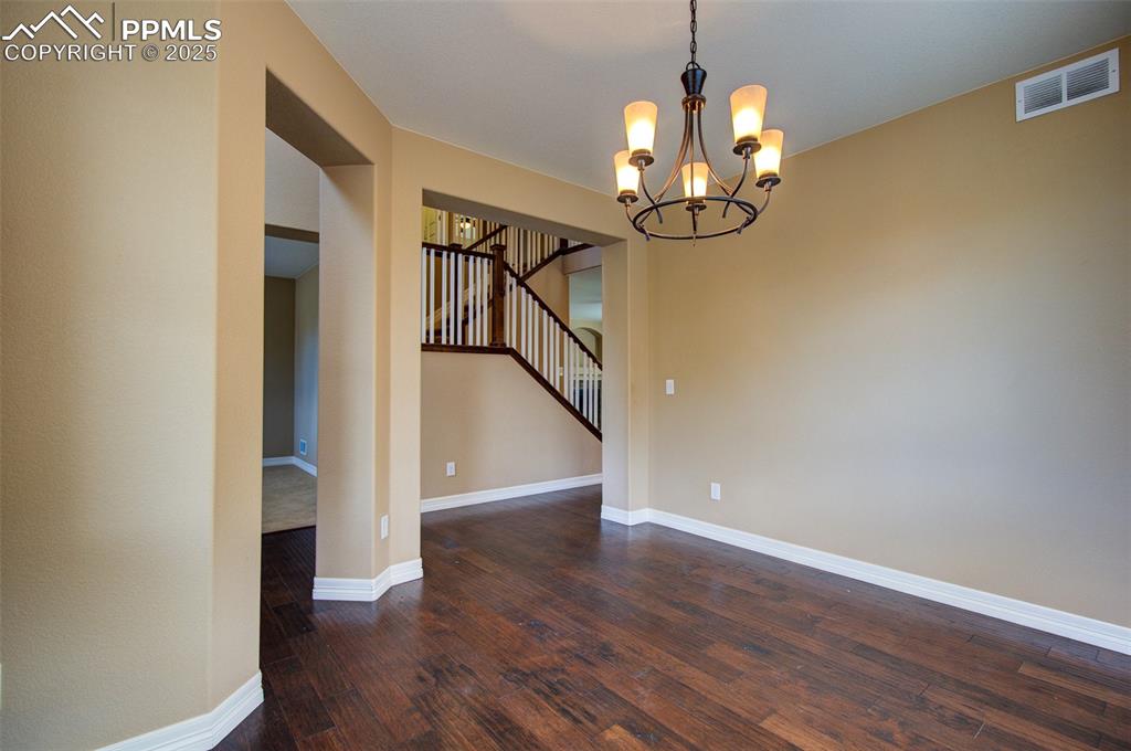 Image 3 of 50: Formal dining area