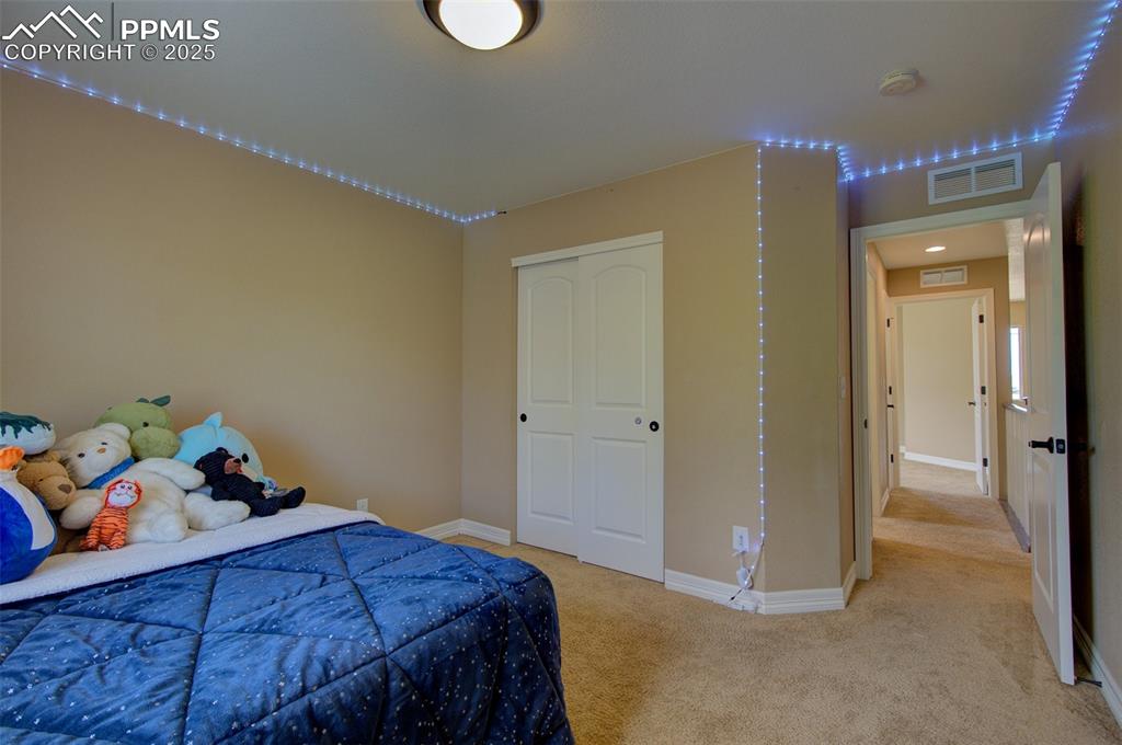 Image 40 of 50: 3rd bedroom with nice sized closet