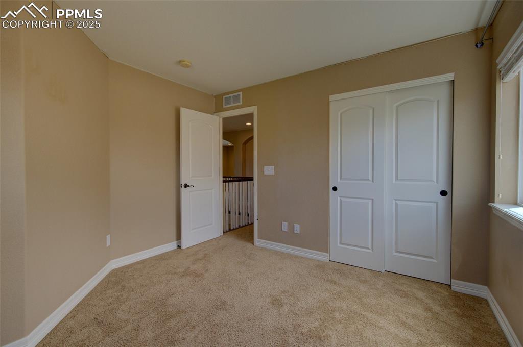 Image 41 of 50: 4th bedroom with nice sized closet