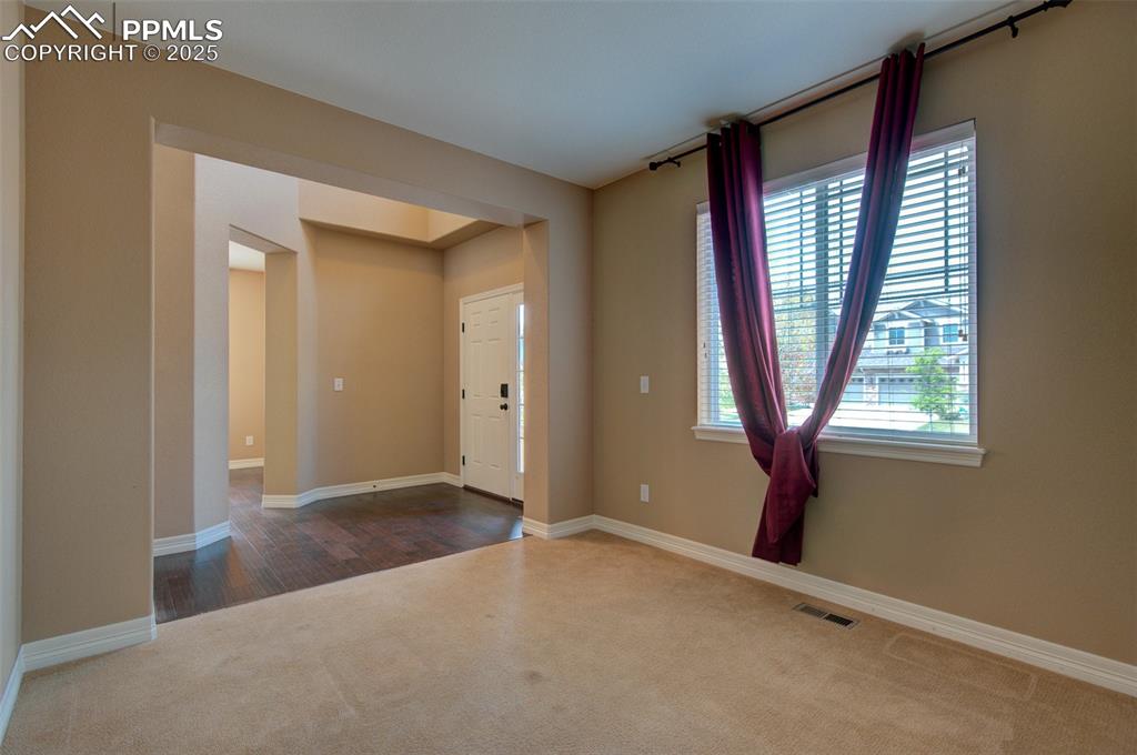 Image 7 of 50: This space is versatile, office, sitting room, etc