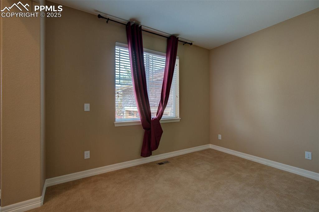 Image 8 of 50: Plenty of natural light from the large window in office