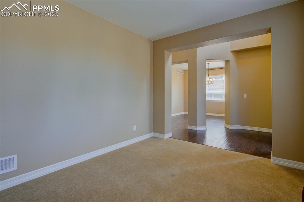 Image 9 of 50: Office looking into the formal dining area