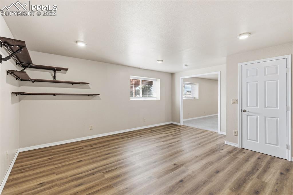 Image 35 of 43: Basement featuring light wood finished floors