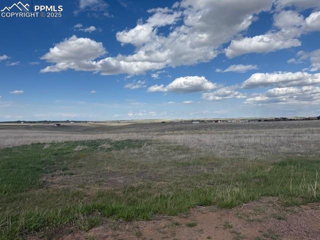 Caption: View of yard with a view of countryside