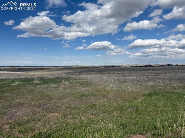 Image 3 of 5: View of yard featuring a view of rural / pastoral area