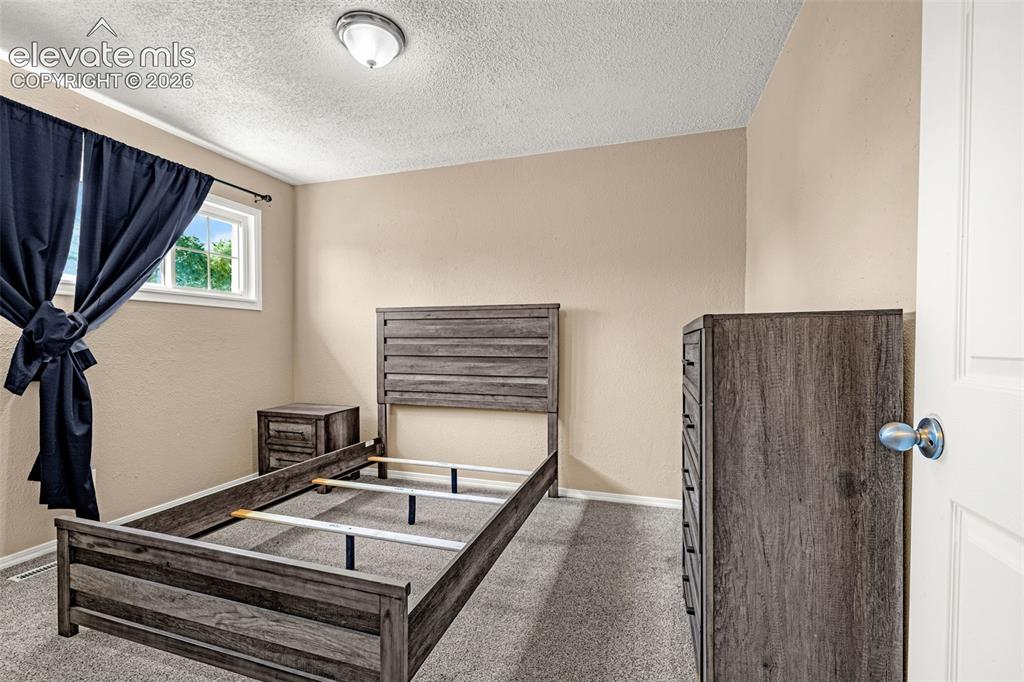 Image 14 of 28: Bedroom