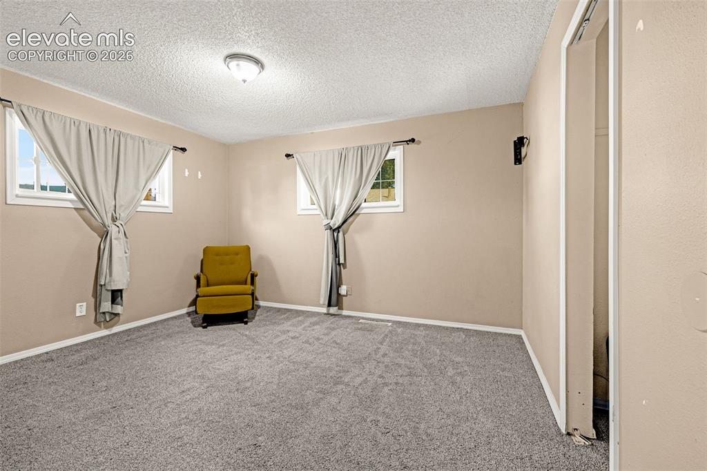 Image 25 of 28: Sitting Room