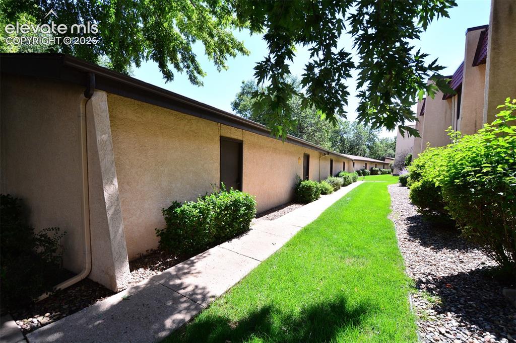 Image 26 of 29: walkway to the detached garage