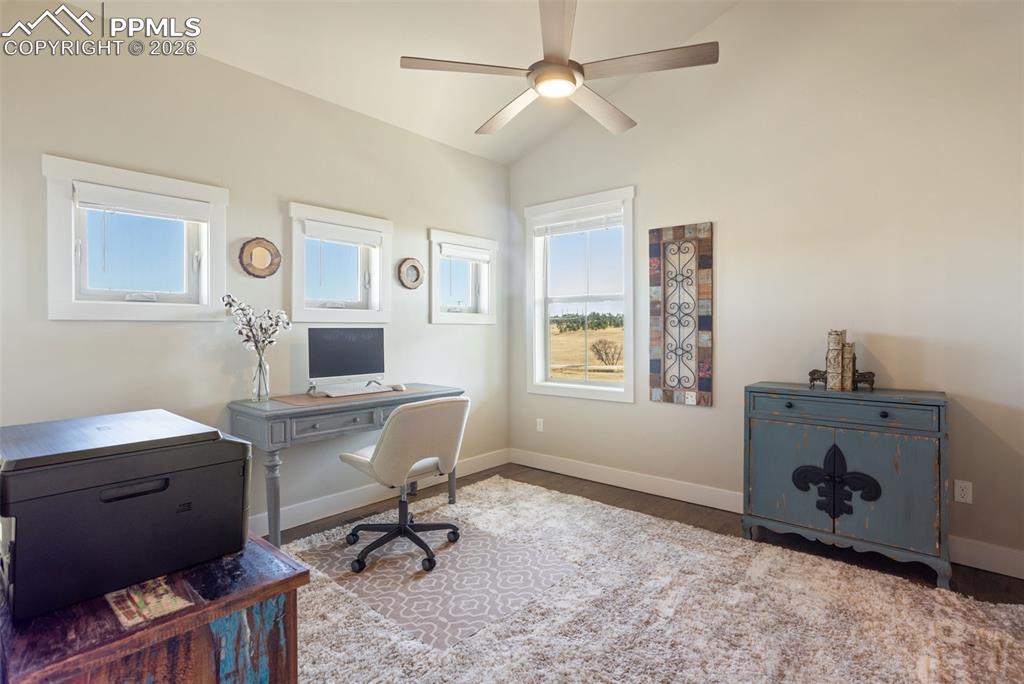 Image 15 of 50: office or bedroom space with walk in closet and attached bathroom